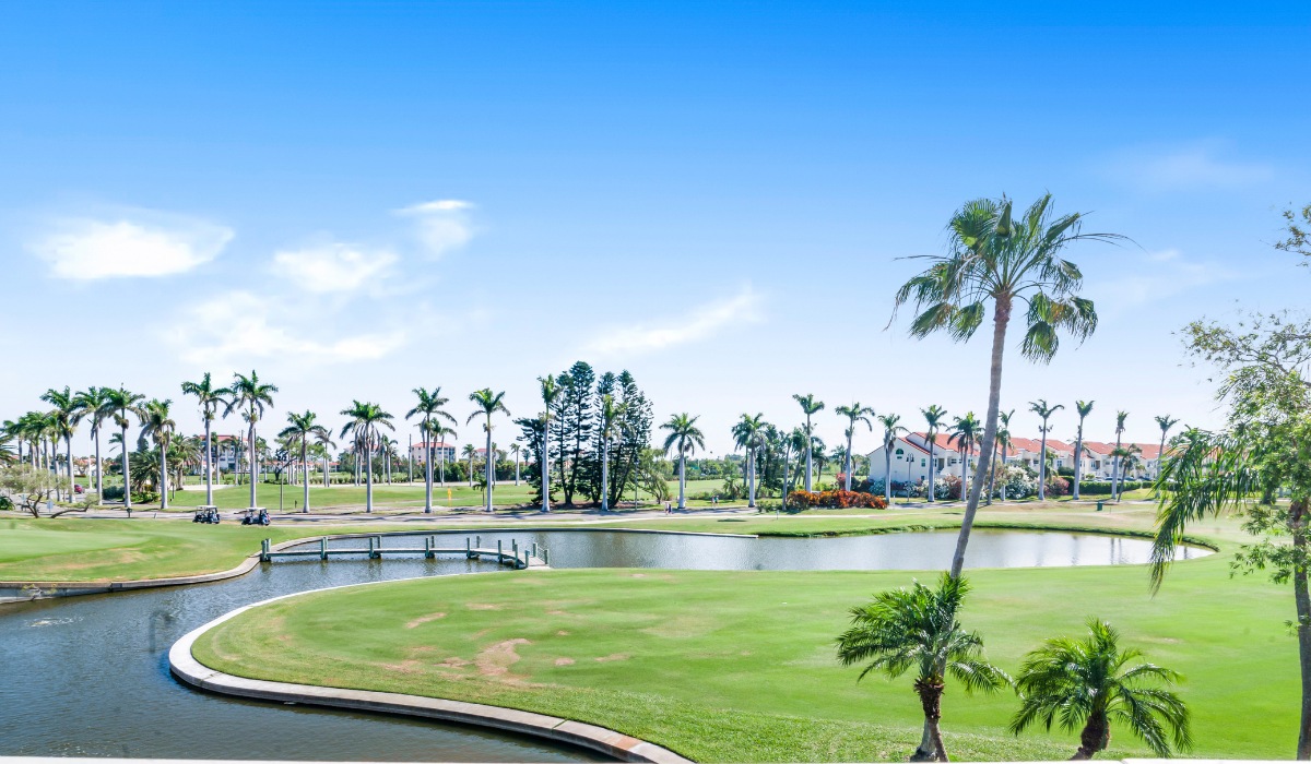 A scenic view of a lush green golf course